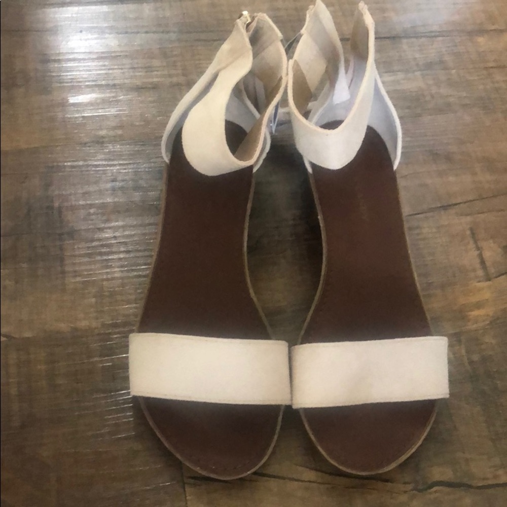 NWT sandals with fringe zipper